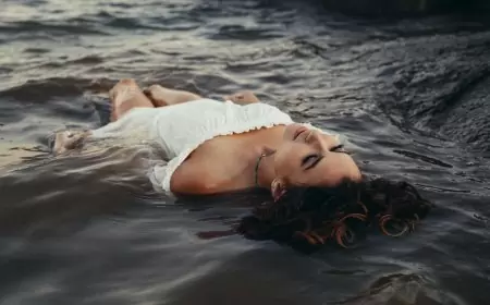 There is a unique and captivating beauty when a woman enters the water