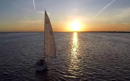 Sailboat sailing during sunset